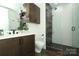 Modern bathroom featuring an elegant vanity and a frameless glass shower with contemporary fixtures at 1100 Metropolitan Ave # 314, Charlotte, NC 28204