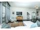 Light and bright living room with hardwood floors and comfortable seating at 1100 Metropolitan Ave # 314, Charlotte, NC 28204