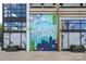 Bright and colorful Midtown mural adorning the exterior of a building at 1100 Metropolitan Ave # 314, Charlotte, NC 28204