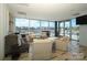 Bright and airy sitting area with modern furnishings, large windows, and access to the pool deck at 1100 Metropolitan Ave # 314, Charlotte, NC 28204