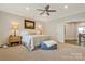 Spacious primary bedroom with neutral walls, carpet, a ceiling fan and access to an adjacent space at 11019 Kilkenny Dr # 41, Charlotte, NC 28277