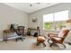 Bedroom with a work space, a large window that provides natural light, and a comfortable seating area at 11019 Kilkenny Dr # 41, Charlotte, NC 28277