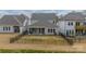 Well-maintained backyard features a cozy patio and privacy fence perfect for entertaining and relaxing outdoors at 11036 Shreveport Dr, Huntersville, NC 28078