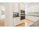 Elegant kitchen with built-in oven, microwave, coffee station, and ample counter space for meal preparation at 11036 Shreveport Dr, Huntersville, NC 28078