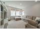 Comfortable living room with plush seating and plenty of natural light at 11036 Shreveport Dr, Huntersville, NC 28078