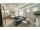 Spacious main bedroom with a sitting area and natural light at 11036 Shreveport Dr, Huntersville, NC 28078