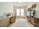 Bright home office with hardwood floors, a large window, and decorative wicker baskets at 11036 Shreveport Dr, Huntersville, NC 28078