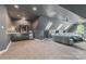 This expansive bonus room features a wet bar, skylights, and ample seating at 114 Ventana Ct, Mooresville, NC 28117