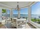 Breakfast nook with water view, chandelier, and tile flooring at 114 Ventana Ct, Mooresville, NC 28117