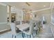 Chic dining room featuring a modern chandelier, stylish chairs, and light neutral walls at 114 Ventana Ct, Mooresville, NC 28117