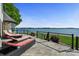 Lounge on a large patio with lake views at 114 Ventana Ct, Mooresville, NC 28117