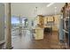A gourmet kitchen with an island, stainless steel appliances, and a breakfast nook with lake views at 114 Ventana Ct, Mooresville, NC 28117