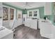Laundry area with washer, dryer, utility sink, and an exterior access door at 11901 Rock Canyon Dr, Charlotte, NC 28226