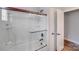 A bathroom with bathtub and shower combo with sliding glass doors at 1504 Ridge Haven Rd, Waxhaw, NC 28173