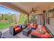 Inviting covered patio featuring comfortable lounge furniture perfect for entertaining at 1504 Ridge Haven Rd, Waxhaw, NC 28173