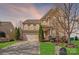 Charming two-story home featuring a well-manicured lawn and a two-car garage, nestled in a suburban neighborhood at 1504 Ridge Haven Rd, Waxhaw, NC 28173