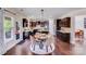 Spacious kitchen with dark wood cabinets, a center island, and eat in table at 1504 Ridge Haven Rd, Waxhaw, NC 28173
