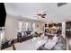 Open-concept living room featuring hardwood floors and seamless flow into the kitchen at 1504 Ridge Haven Rd, Waxhaw, NC 28173