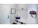 Welcoming mudroom with built-in bench, storage cubbies, and coat hooks at 1504 Ridge Haven Rd, Waxhaw, NC 28173