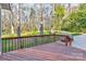 Inviting wood deck perfect for outdoor gatherings overlooking a lush backyard at 1537 Wheaton Nw Way, Concord, NC 28027