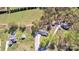 Panoramic aerial view of multiple homes, green fields, and wooded areas in a rural setting at 1584 Beverly Ln, Lincolnton, NC 28092