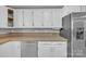 Modern kitchen featuring ample counter space, stainless steel appliances, and white cabinets at 1584 Beverly Ln, Lincolnton, NC 28092