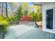 Spacious back deck with wooden railing providing ample room for outdoor furniture and scenic views at 165 Mimosa Ter, Wadesboro, NC 28170