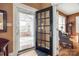 View of the interior entryway with a glimpse into the screened porch and living spaces at 165 Mimosa Ter, Wadesboro, NC 28170