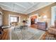 Spacious living room with hardwood floors, fireplace, and adjoining rooms at 165 Mimosa Ter, Wadesboro, NC 28170