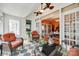 Sunroom featuring wicker furniture, bright light, and views into an adjacent room at 165 Mimosa Ter, Wadesboro, NC 28170