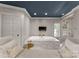 Luxurious bathroom features a deep soaking tub, separate glass shower, and stylish fixtures at 2015 Pellyn Wood Dr, Charlotte, NC 28226