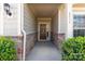 Inviting entryway with stone accents, house number, and a charming front door with decorative wreath at 2035 Palace Way, Indian Land, SC 29707