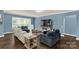 Relaxing living room with large windows, modern furnishings, and neutral color scheme at 2035 Palace Way, Indian Land, SC 29707