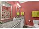 Bright bathroom featuring granite countertops, dual mirrors, and a floral shower curtain at 2035 Palace Way, Indian Land, SC 29707