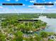 Panoramic aerial view showcasing the neighborhood and convenient access to Shops @ the Fresh Market and Hello Sailor & Holiday Marina at 21220 Rio Oro Dr, Cornelius, NC 28031