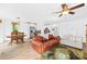 Open-concept living and dining area with hardwood floors, natural light, and a cozy atmosphere at 21220 Rio Oro Dr, Cornelius, NC 28031