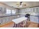 Bright kitchen with white cabinetry, white appliances and tile flooring at 216 Sylvan Rd, China Grove, NC 28023