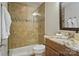 Bathroom featuring a shower, decorative tile, and a granite countertop offering comfort and style at 2228 Metcalf Dr, Sherrills Ford, NC 28673