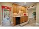 Classic kitchen design with stainless appliances, wood cabinets, and tile backsplash at 2228 Metcalf Dr, Sherrills Ford, NC 28673
