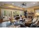 Cozy living room with a fireplace, comfortable seating, and French doors to the outside, perfect for relaxation and entertaining at 2228 Metcalf Dr, Sherrills Ford, NC 28673