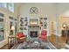 Cozy living room with stone fireplace, built-in shelves, and comfortable seating at 2228 Metcalf Dr, Sherrills Ford, NC 28673