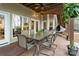 Covered patio with a dining table, chairs, and views of the backyard at 2228 Metcalf Dr, Sherrills Ford, NC 28673