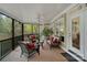 Inviting screened porch with comfortable seating and beautiful natural views at 2228 Metcalf Dr, Sherrills Ford, NC 28673