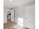 Bright bedroom featuring hardwood floors with an entrance to the kitchen at 243 Barber St, Rock Hill, SC 29730