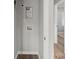 A simple utility area with hookups for laundry machines and modern wood-look floors at 243 Barber St, Rock Hill, SC 29730