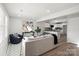 Stylish living room with open access to the kitchen and stainless steel appliances at 243 Barber St, Rock Hill, SC 29730