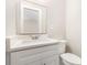 Bright bathroom with white vanity, countertop, new fixtures, and a toilet at 2714 Dogwood Cir, Charlotte, NC 28208