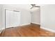 Bedroom boasting ample closet space and beautiful hardwood floors at 2714 Dogwood Cir, Charlotte, NC 28208