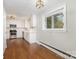 Beautiful kitchen featuring white cabinets, stainless steel appliances, and hardwood flooring at 2714 Dogwood Cir, Charlotte, NC 28208