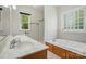 Bright bathroom featuring a jetted tub and double sinks at 2805 Sadler Rd, Alexis, NC 28006